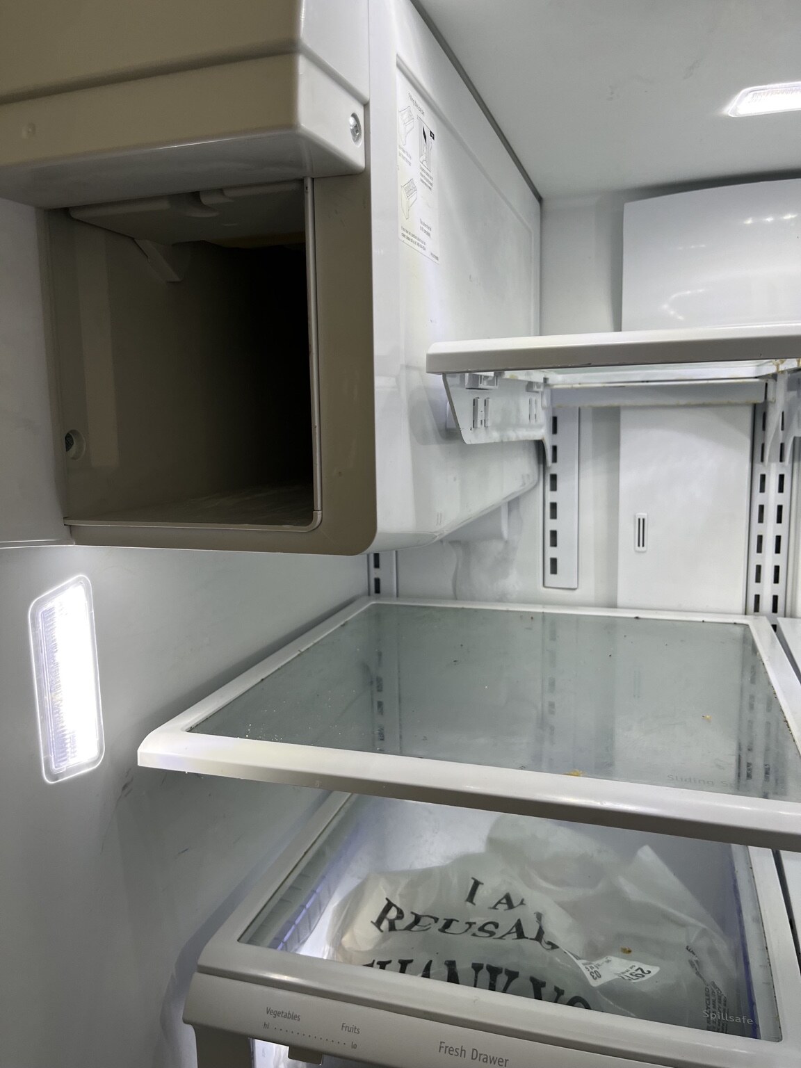 Refrigerator ice maker housing resealed to prevent a solid block of ice by ProStar Appliance Service
