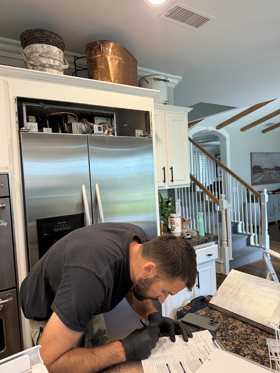ProStar technician diagnosing a KitchenAid built-in refrigerator in Las Flores